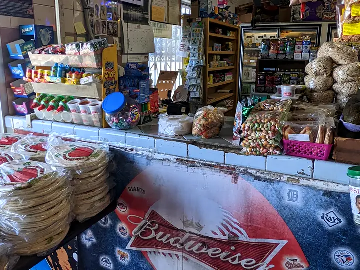 The Flores Jr. counter with stacks of tortillas, candy, snacks and dried chiles.